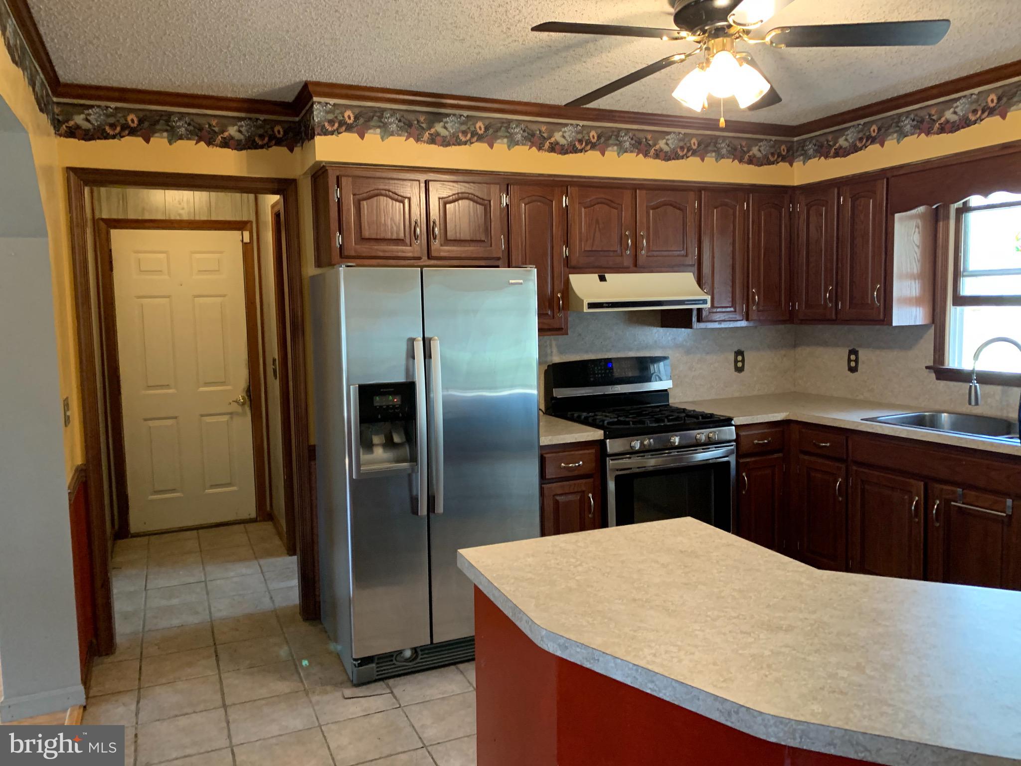 120 Lums Pond Road Bear, DE 19701 - Photo 8 of 28 Easy access from garage to laundry room & kitchen.
