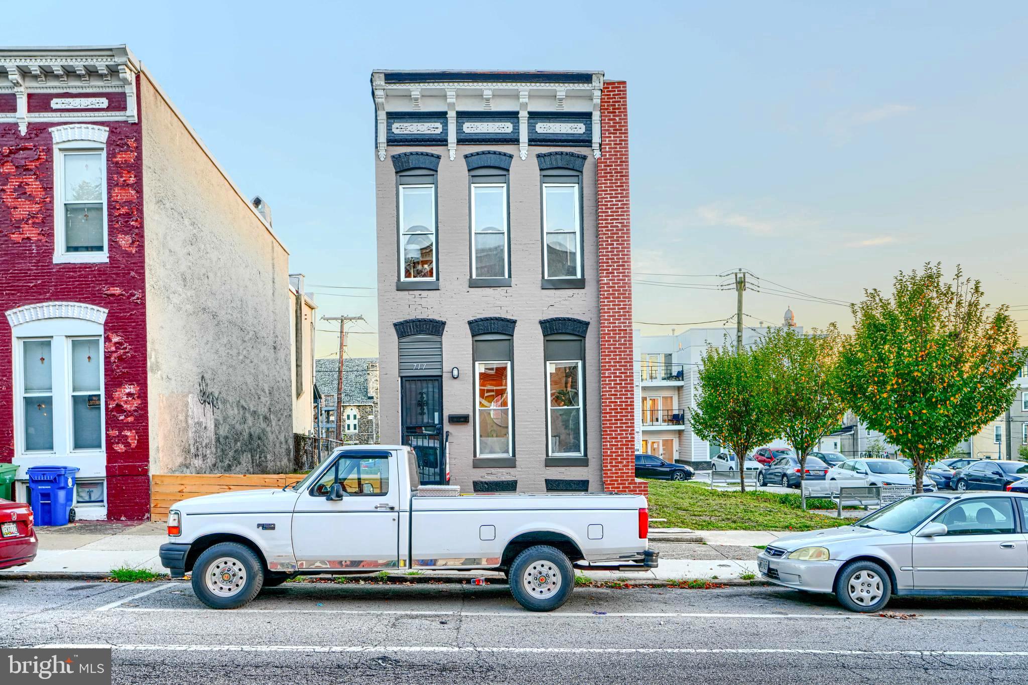 717 East Biddle Street Baltimore, MD 21202 - Photo 2 of 47 a car parked in front of a building