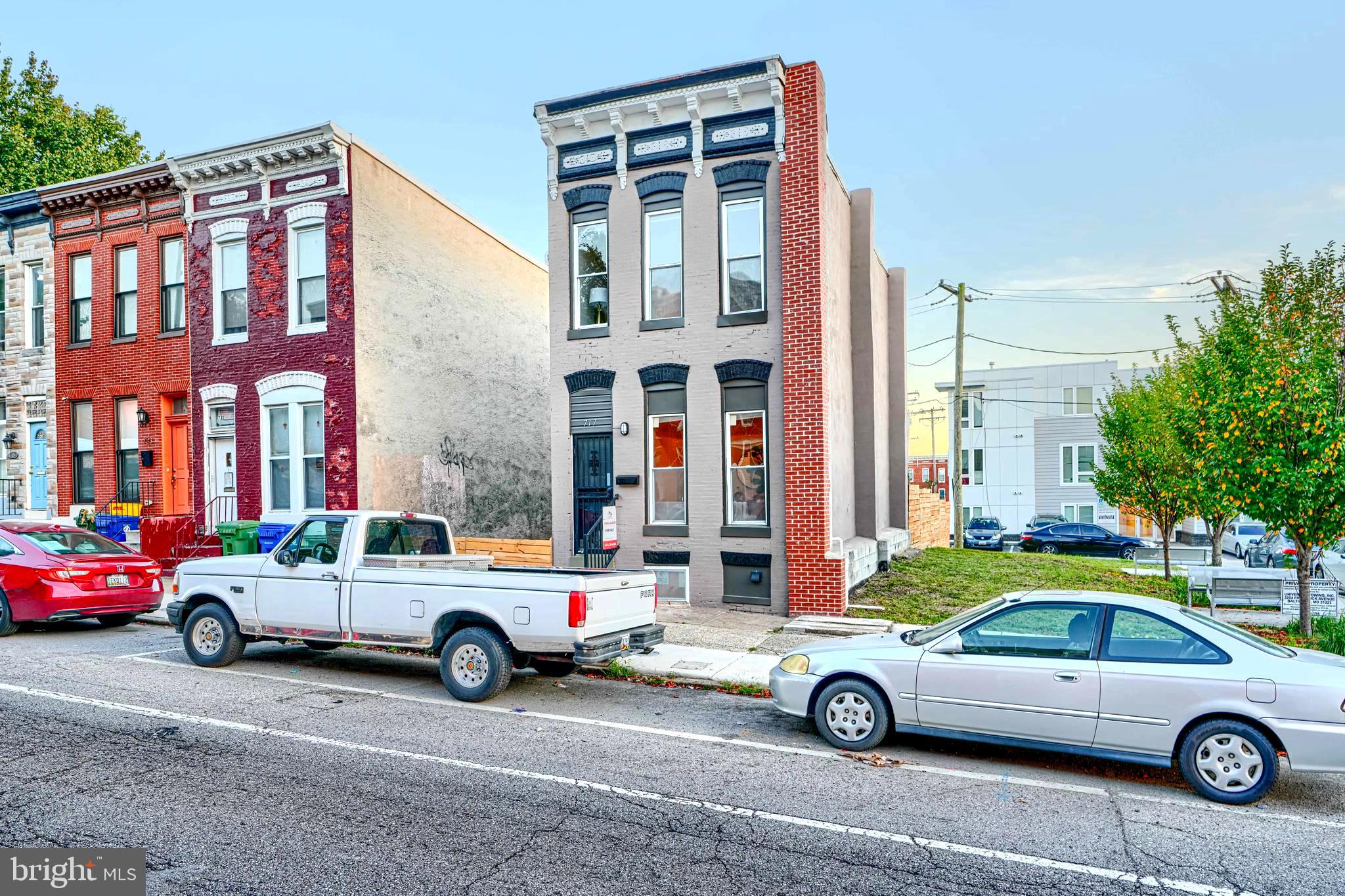 717 East Biddle Street Baltimore, MD 21202 - Photo 3 of 47 a car parked in front of a building