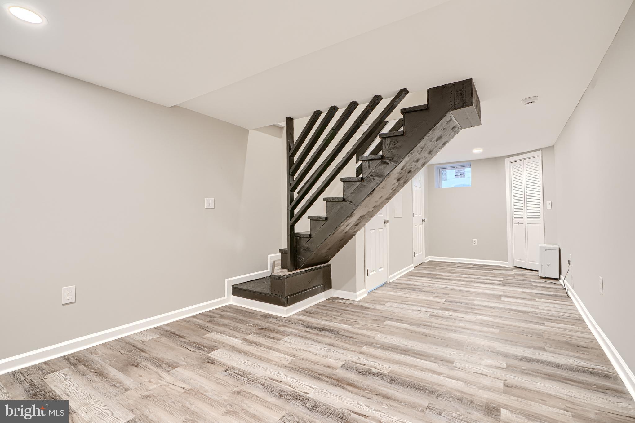 717 East Biddle Street Baltimore, MD 21202 - Photo 39 of 47 a view of an empty room with stairs and stairs