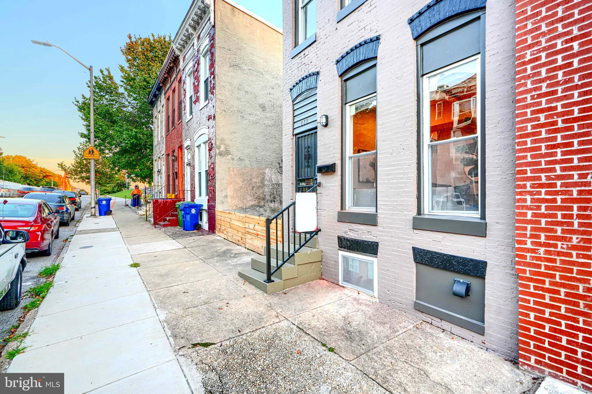 717 East Biddle Street Baltimore, MD 21202 - Photo 5 of 47 a view of a multi story building with many windows