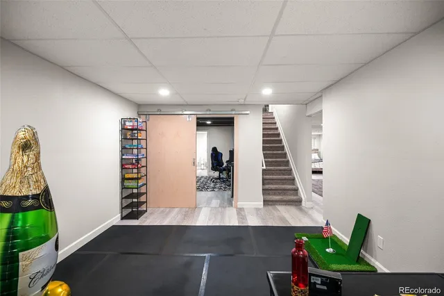 a view of a living room and entryway