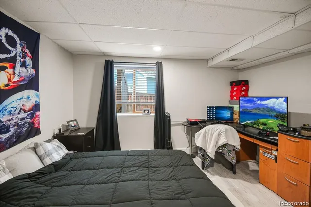 a bedroom with furniture and a bed