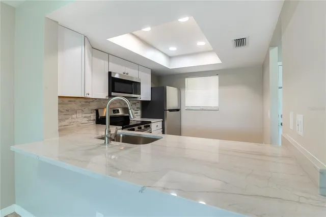 a view of outdoor space with swimming pool