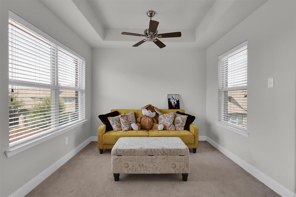 4504 Del Rey Avenue McKinney, TX 75070 - Photo 16 of 40 a living room with furniture and a window