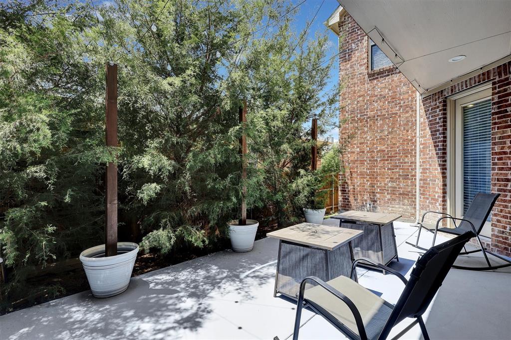 4504 Del Rey Avenue McKinney, TX 75070 - Photo 36 of 40 a view of a patio with couple of chairs and a potted plants