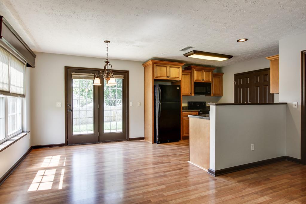 1909 Portway Road Spring Hill, TN 37174 - Photo 11 of 30 a view of a room with wooden floor and windows
