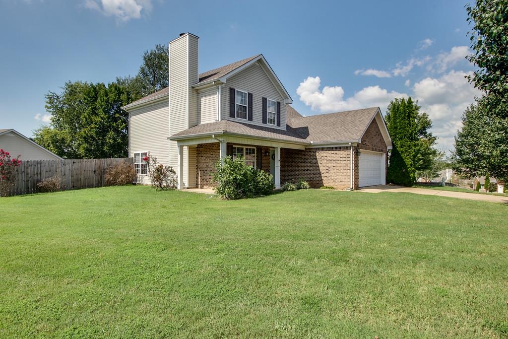1909 Portway Road Spring Hill, TN 37174 - Photo 2 of 30 front view of a house with a yard