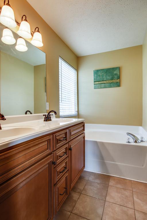 1909 Portway Road Spring Hill, TN 37174 - Photo 21 of 30 a spacious bathroom with a tub sink and mirror