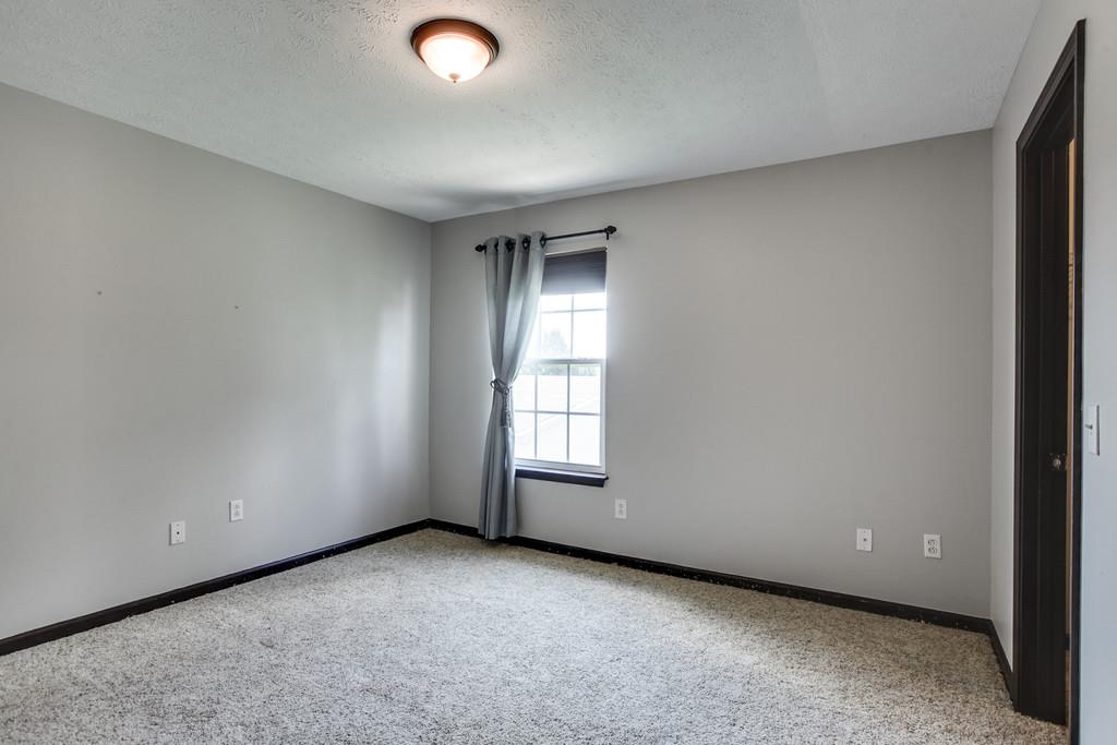 1909 Portway Road Spring Hill, TN 37174 - Photo 24 of 30 an empty room with closet and windows