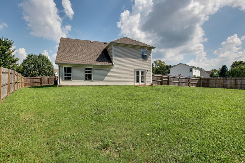 1909 Portway Road Spring Hill, TN 37174 - Photo 29 of 30 a view of a house with a yard and sitting area