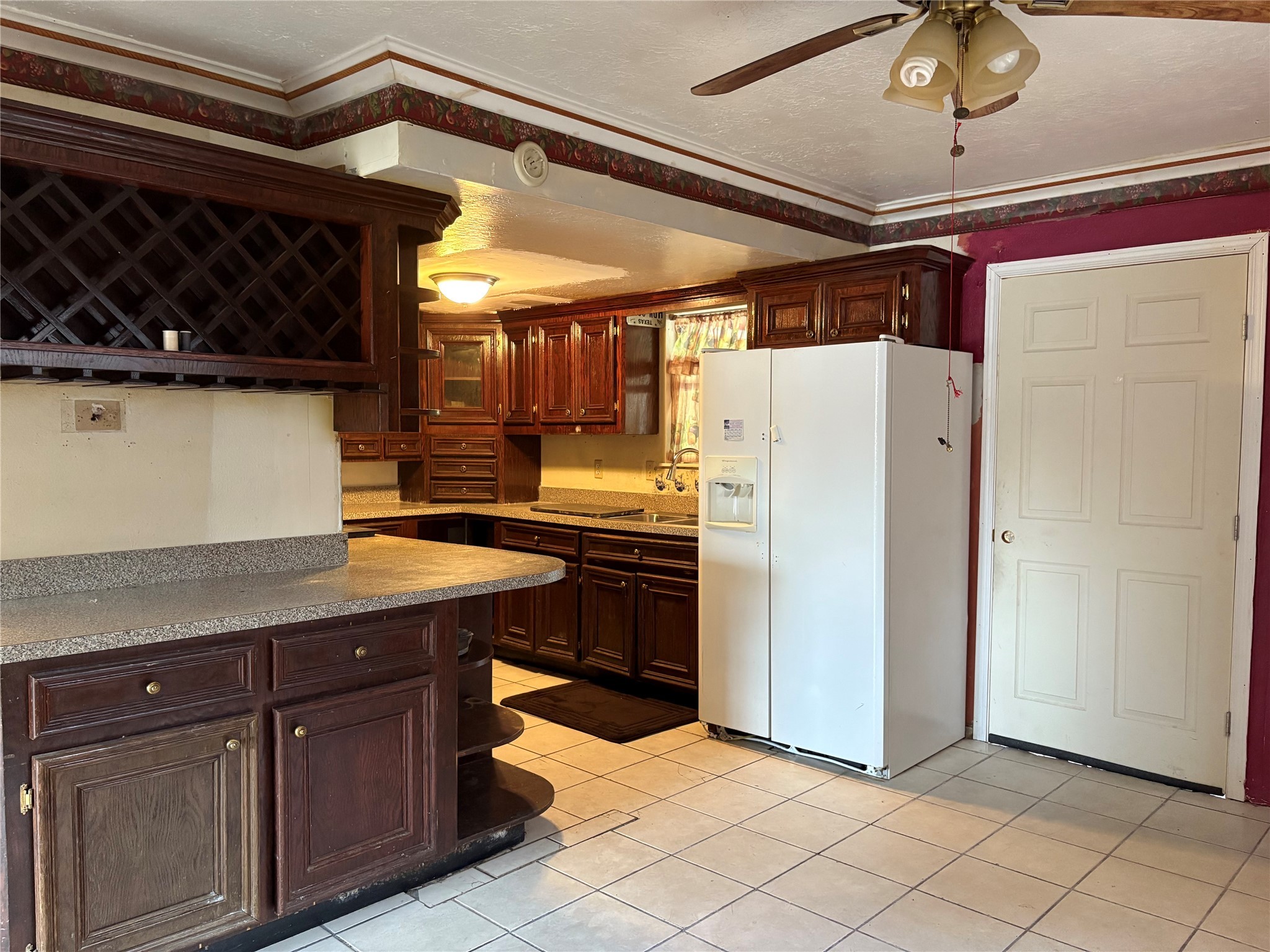 2131 Campbell Road Houston, TX 77080 - Photo 7 of 39 a kitchen with stainless steel appliances granite countertop a refrigerator and a stove