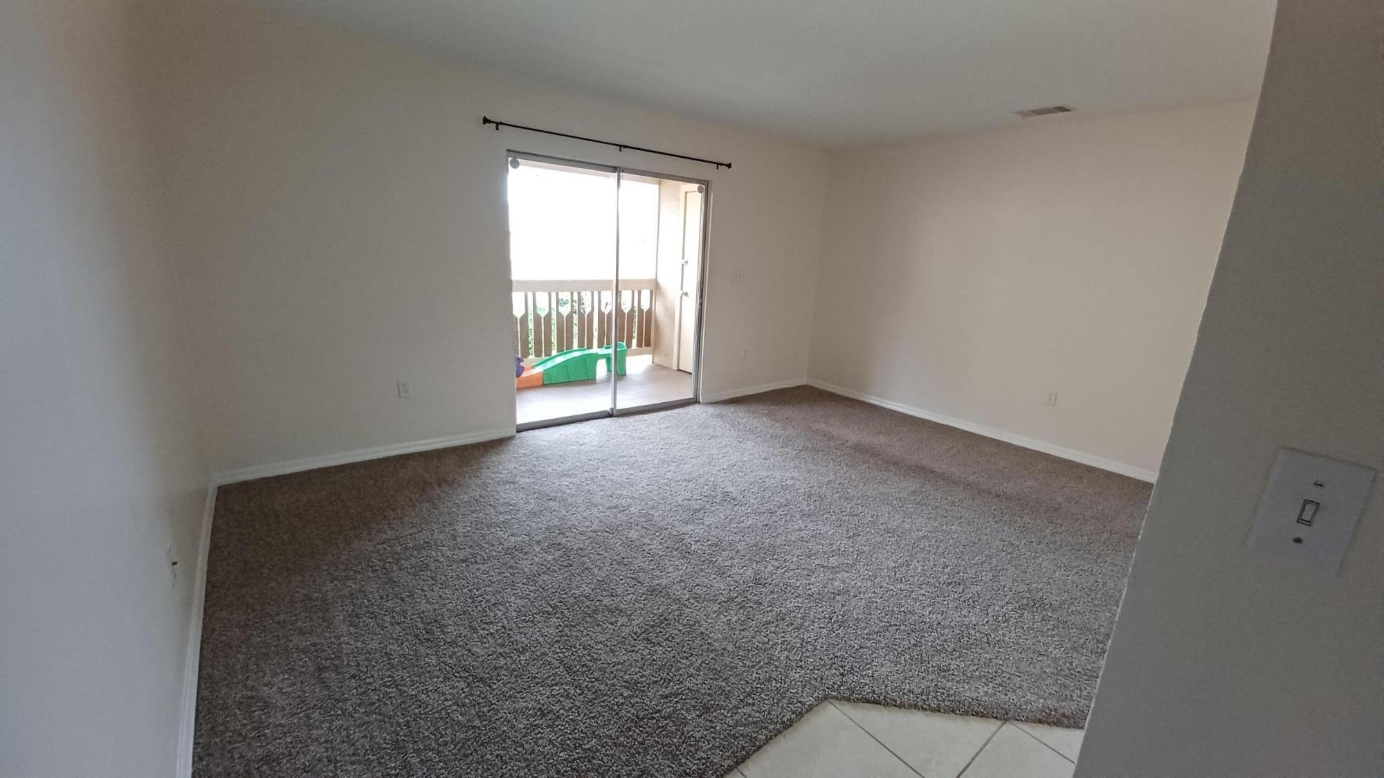 280 Ulster Lane Melbourne, FL 32935 - Photo 2 of 34 a view of an empty room with a window