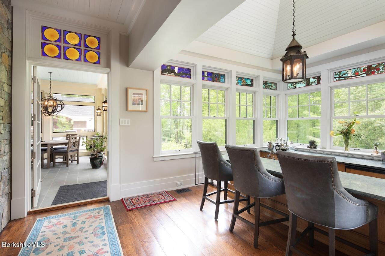 50 E Road Alford, MA 01266 - Photo 13 of 60 a view of a dining room with furniture window and wooden floor