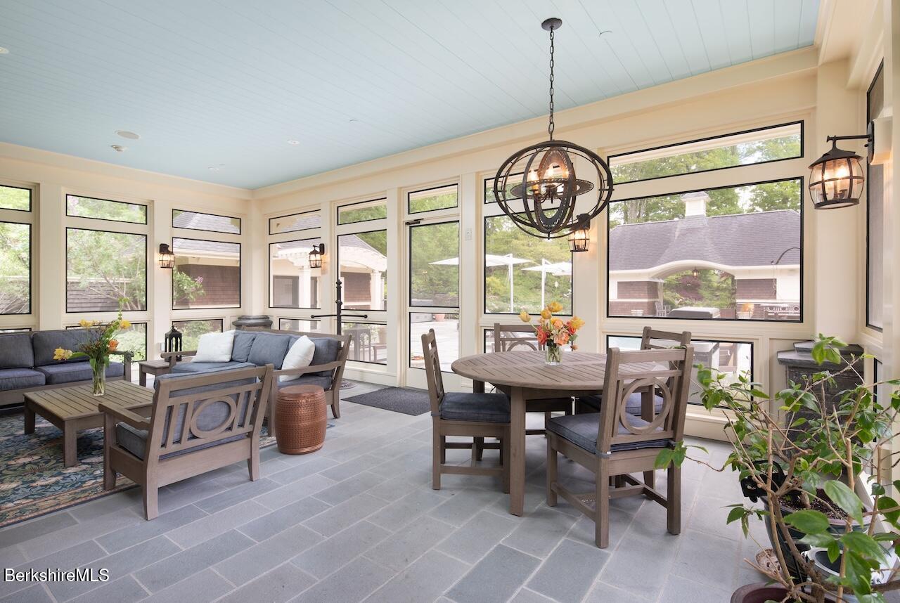 50 E Road Alford, MA 01266 - Photo 15 of 60 a view of a dining room with furniture window and outside view