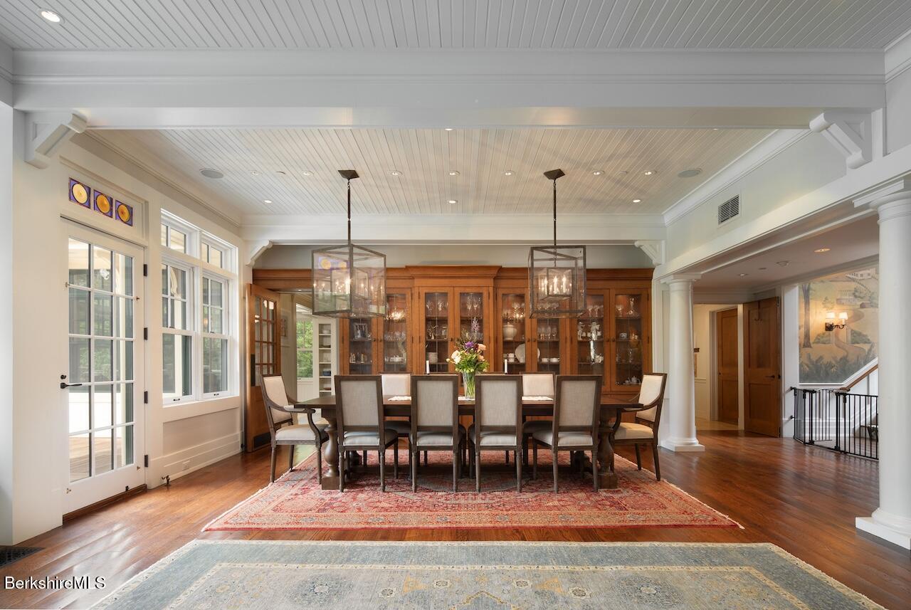 50 E Road Alford, MA 01266 - Photo 19 of 60 a view of a dining room with furniture window and wooden floor