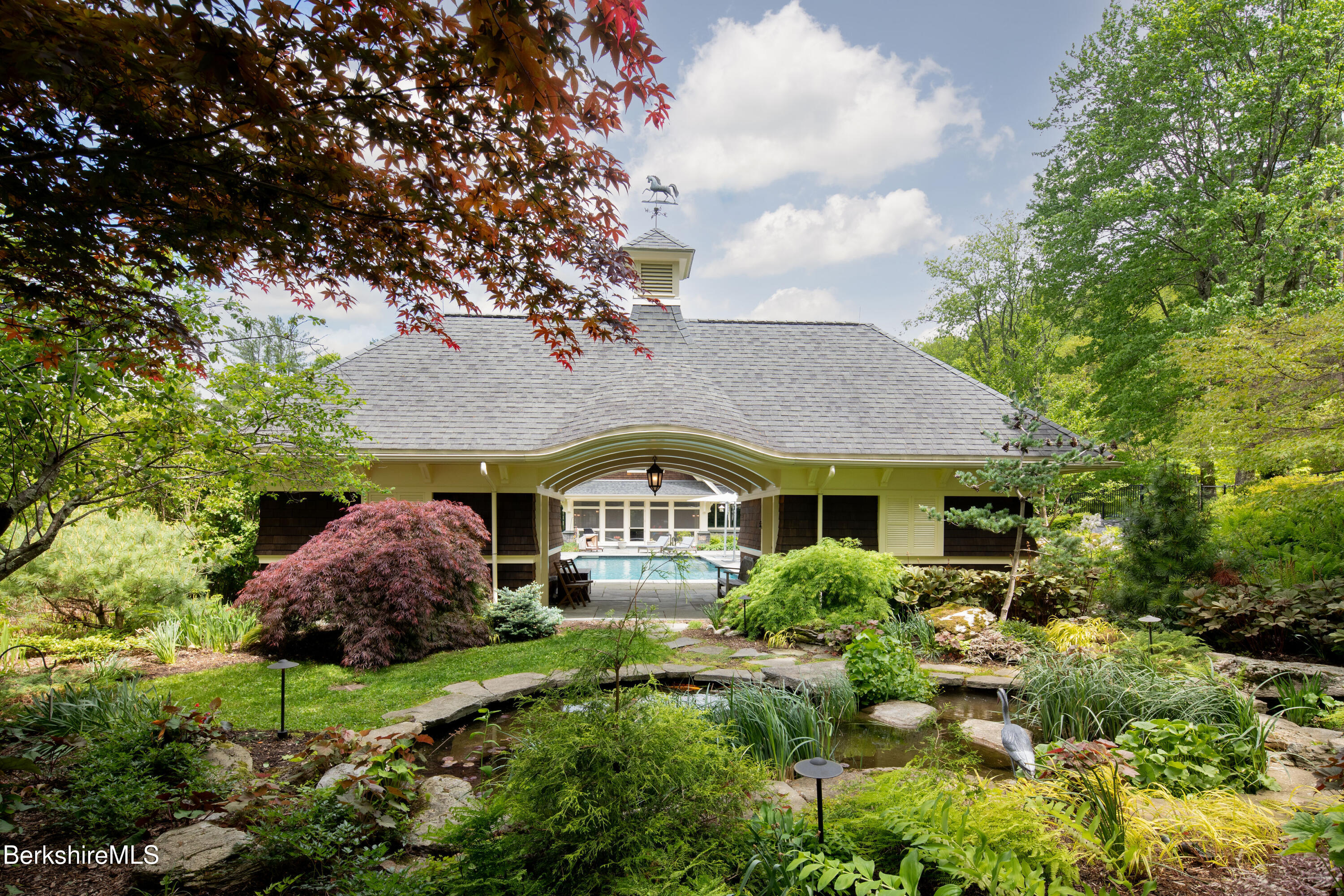 50 E Road Alford, MA 01266 - Photo 2 of 60 a house view with a garden space