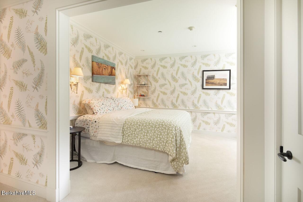 50 E Road Alford, MA 01266 - Photo 36 of 60 a bedroom with a bed and a wall painting