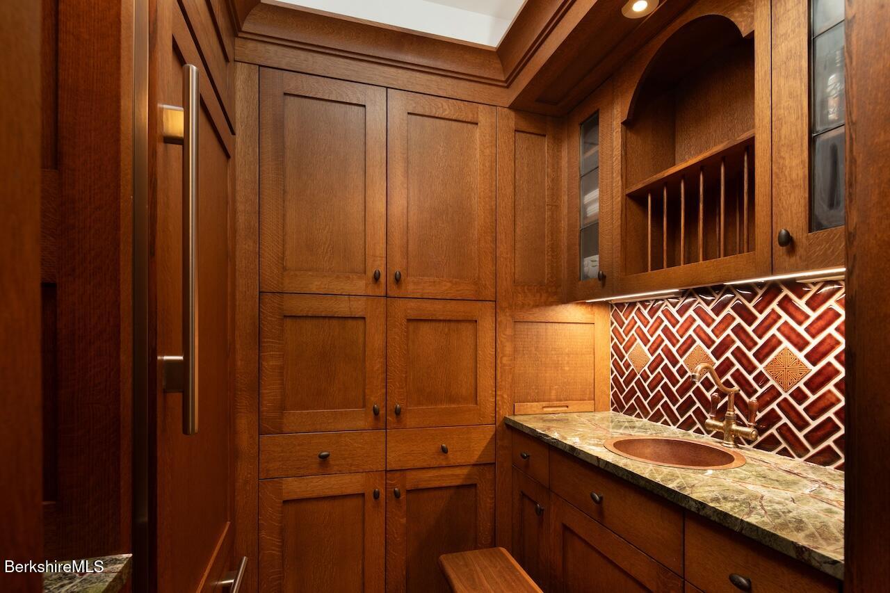 50 E Road Alford, MA 01266 - Photo 47 of 60 a bathroom with a sink and a mirror