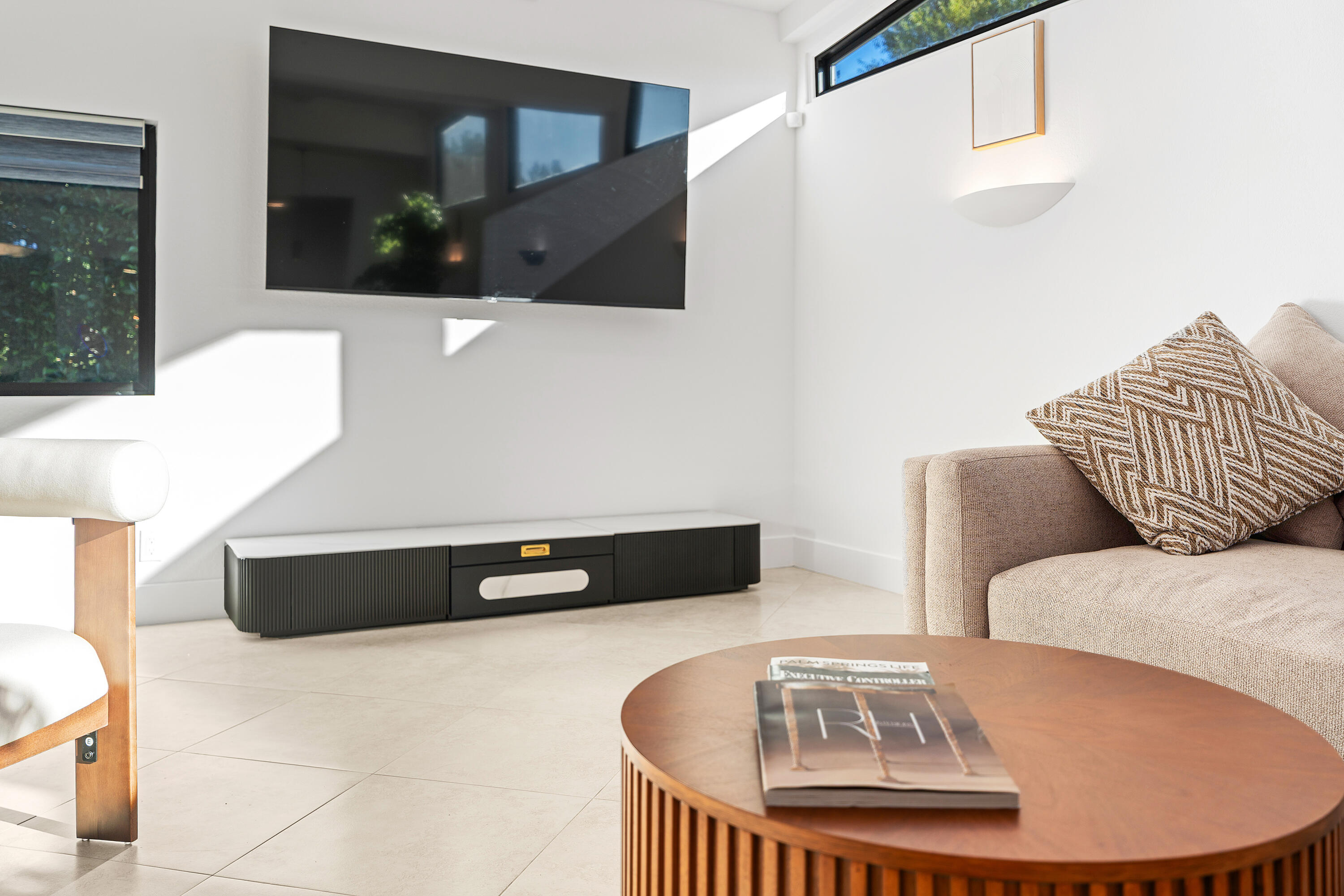 72114 Follansbee Road Rancho Mirage, CA 92270 - Photo 11 of 58 a living room with furniture and a flat screen tv
