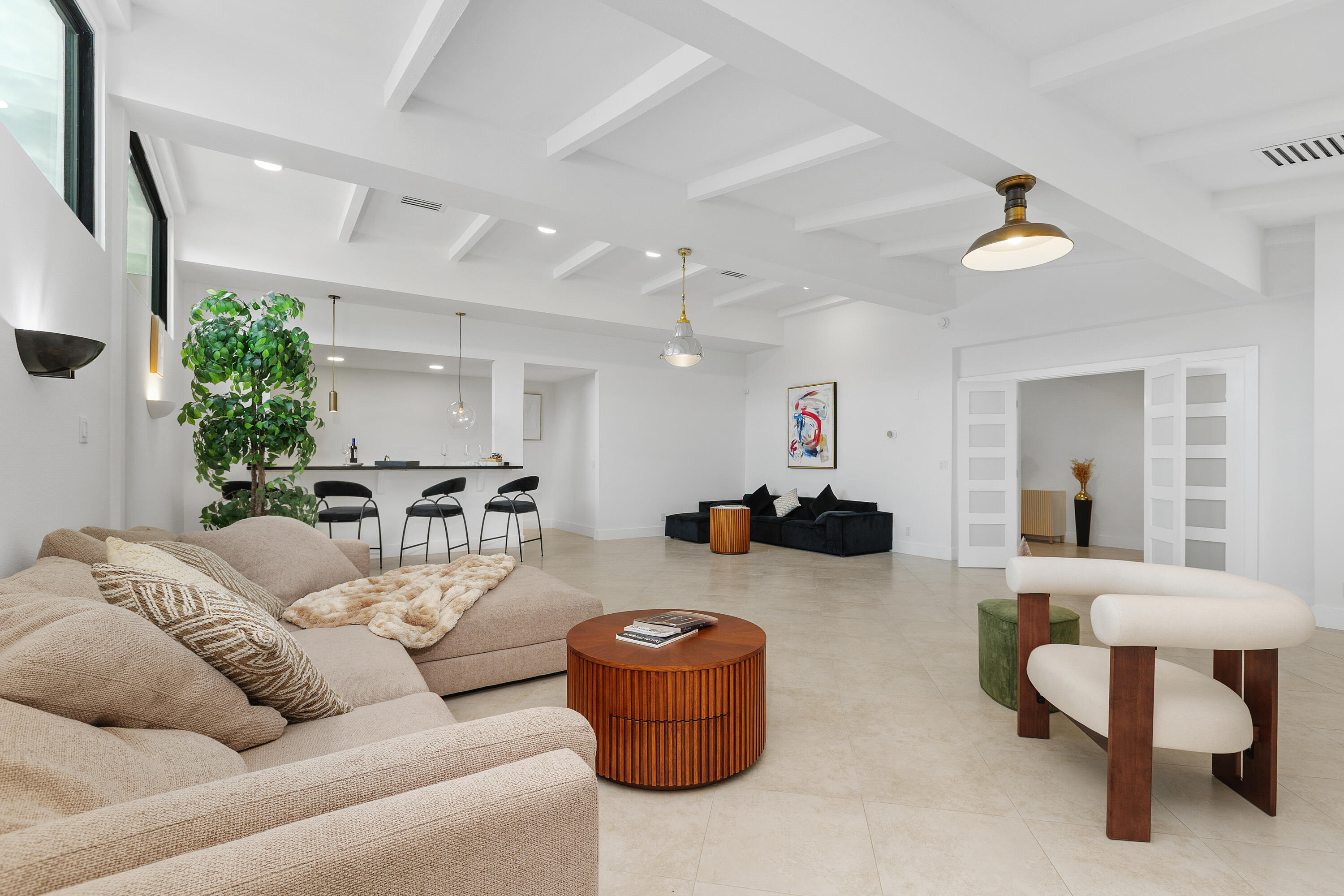 72114 Follansbee Road Rancho Mirage, CA 92270 - Photo 12 of 58 a living room with furniture and a chandelier