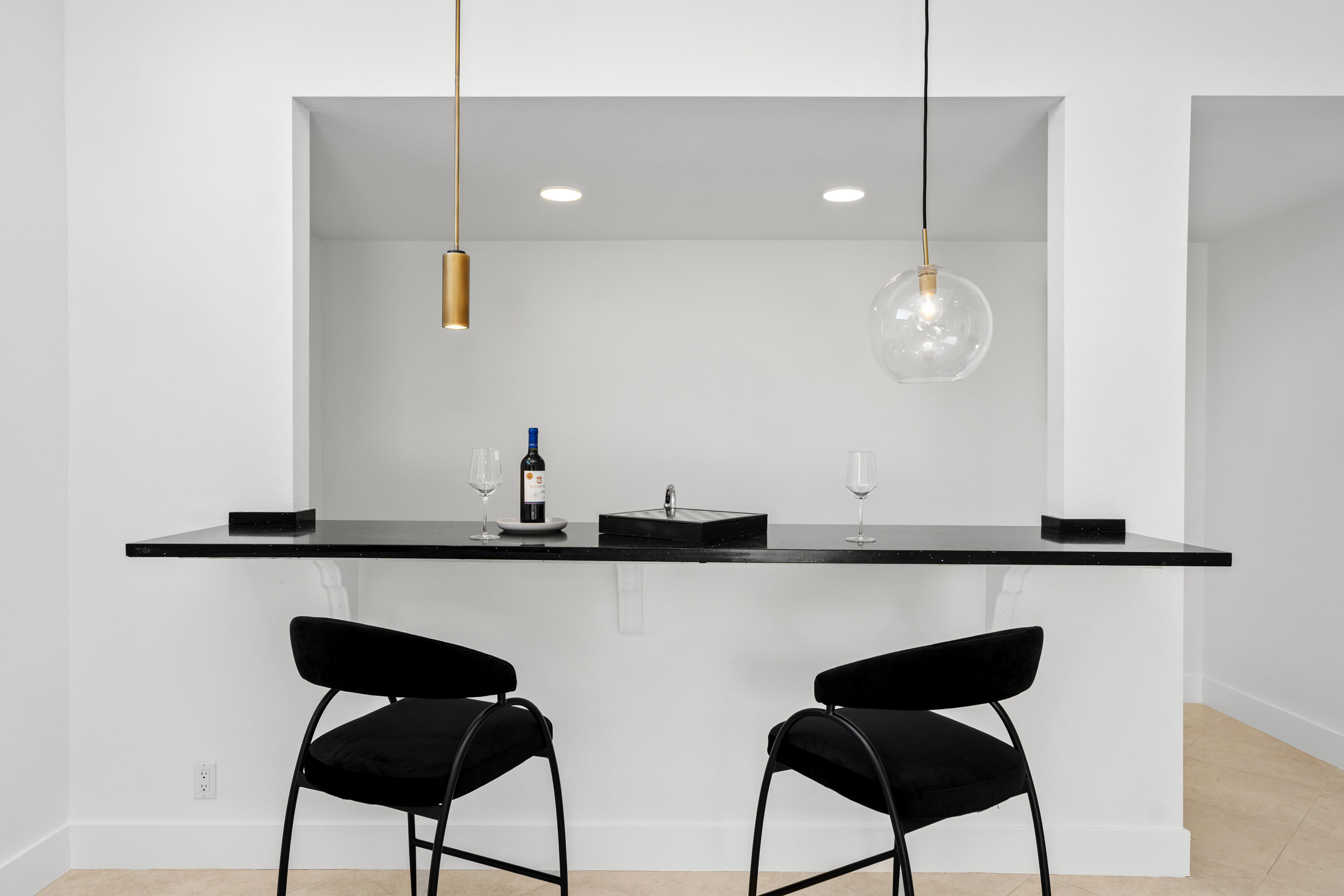 72114 Follansbee Road Rancho Mirage, CA 92270 - Photo 13 of 58 a kitchen with a table chairs and a microwave