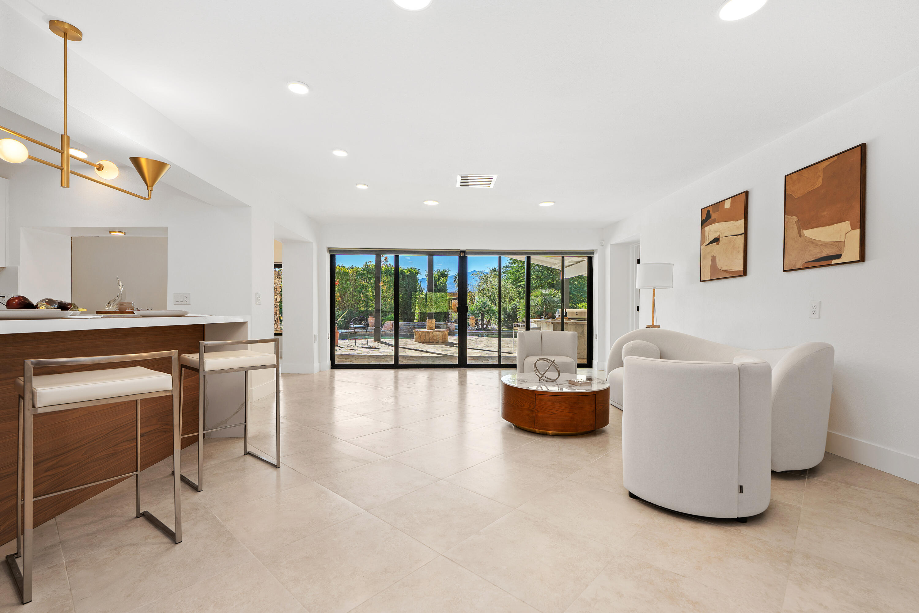 72114 Follansbee Road Rancho Mirage, CA 92270 - Photo 22 of 58 a living room with furniture and windows