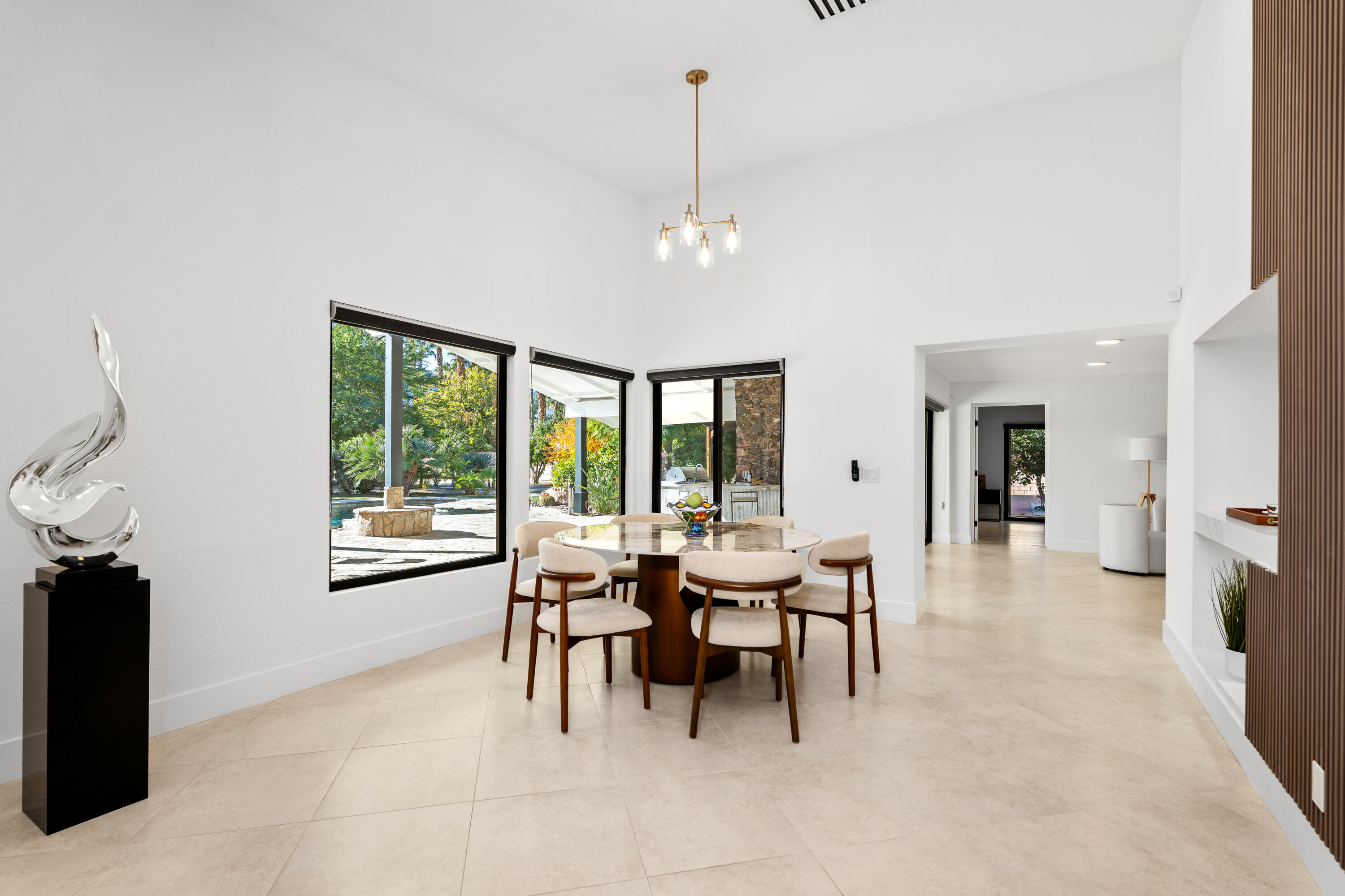72114 Follansbee Road Rancho Mirage, CA 92270 - Photo 26 of 58 a dining room with furniture and window