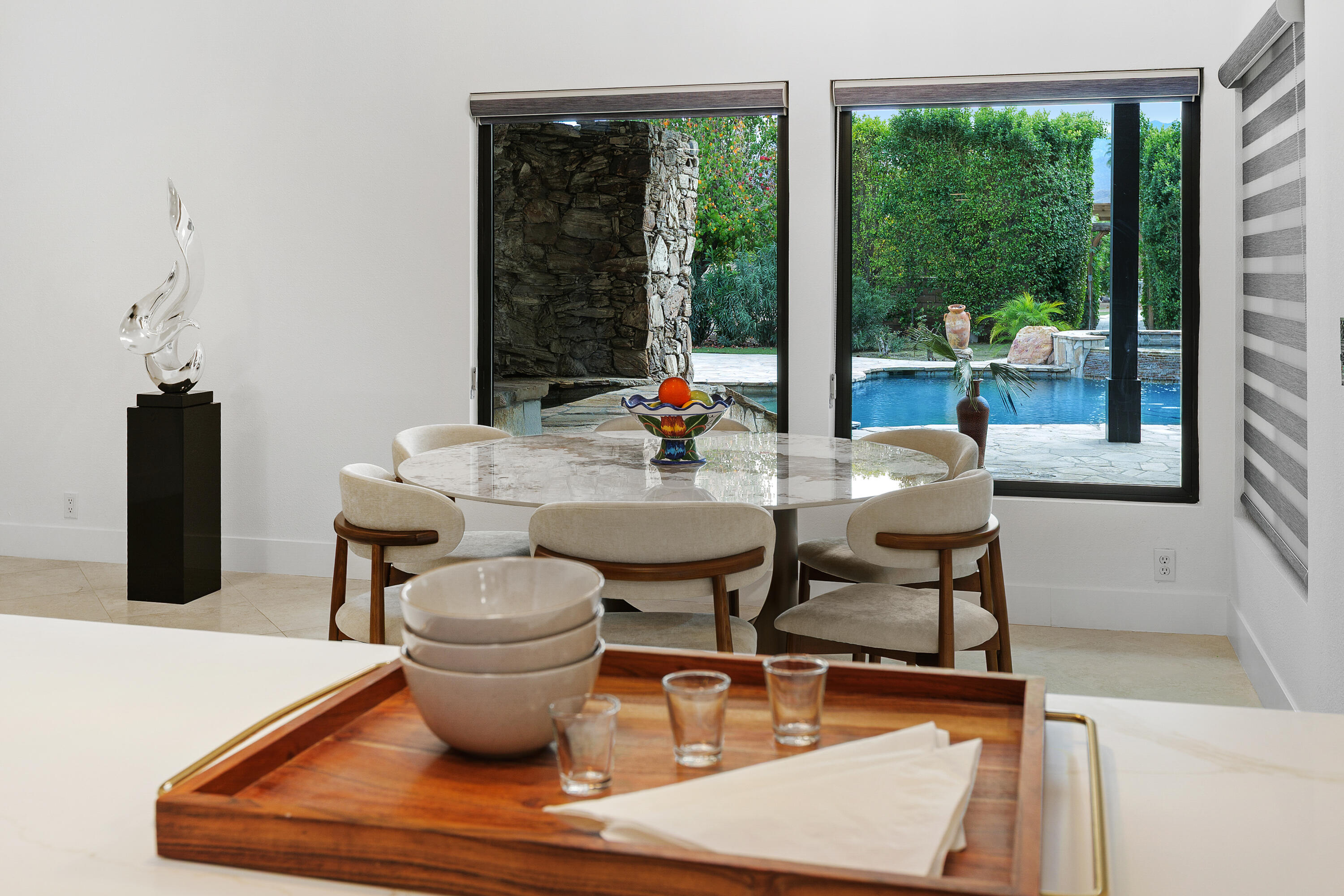 72114 Follansbee Road Rancho Mirage, CA 92270 - Photo 28 of 58 a view of a dining room with furniture window and outside view