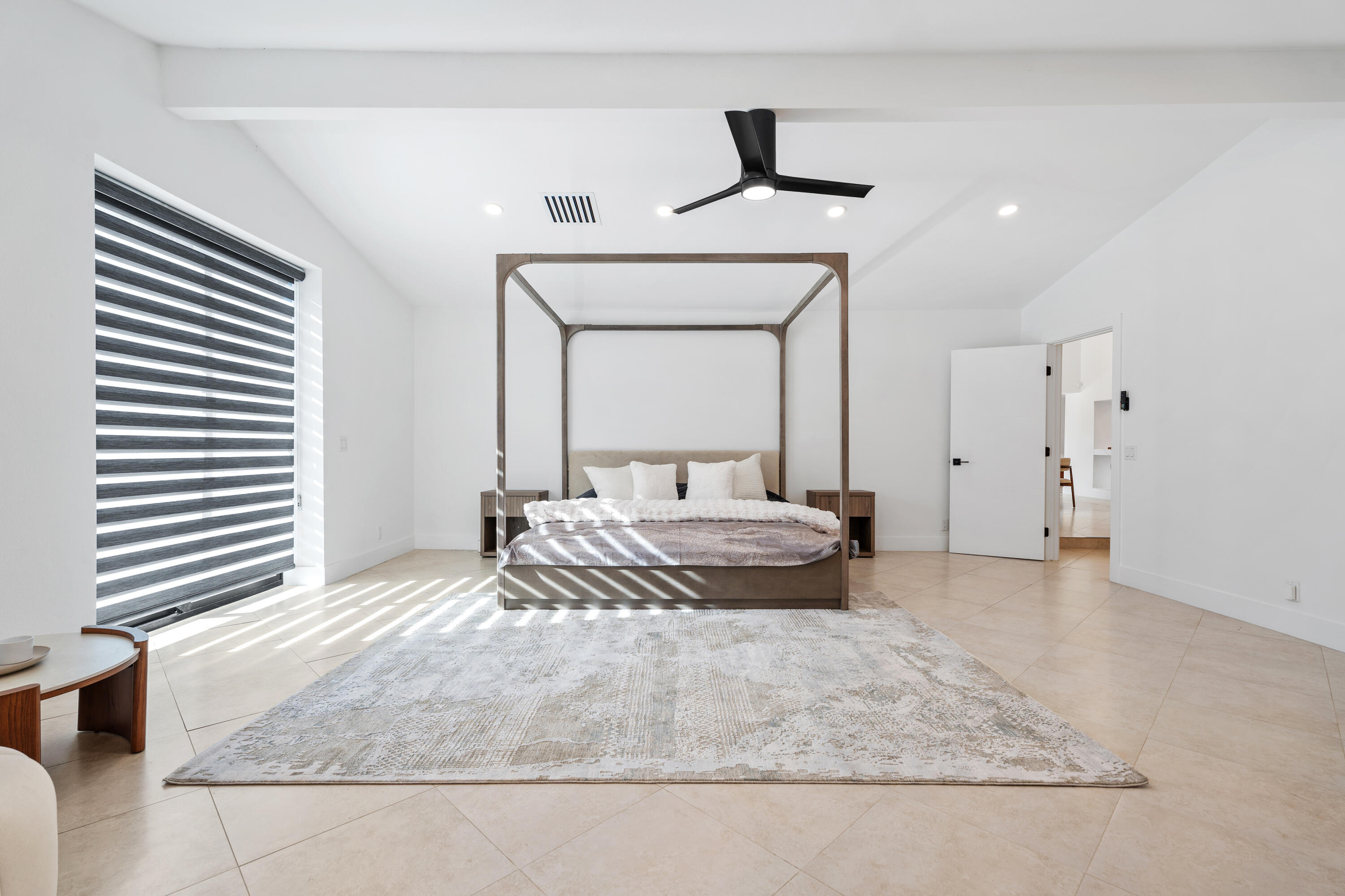 72114 Follansbee Road Rancho Mirage, CA 92270 - Photo 43 of 58 a living room with furniture and a chandelier