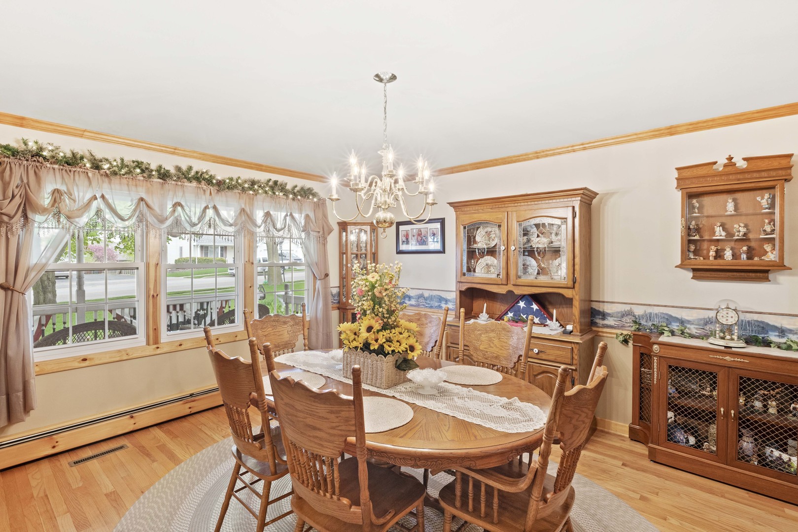 200 South Rathje Road Peotone, IL 60468 - Photo 15 of 39 a view of a dining room with furniture large windows and wooden floor