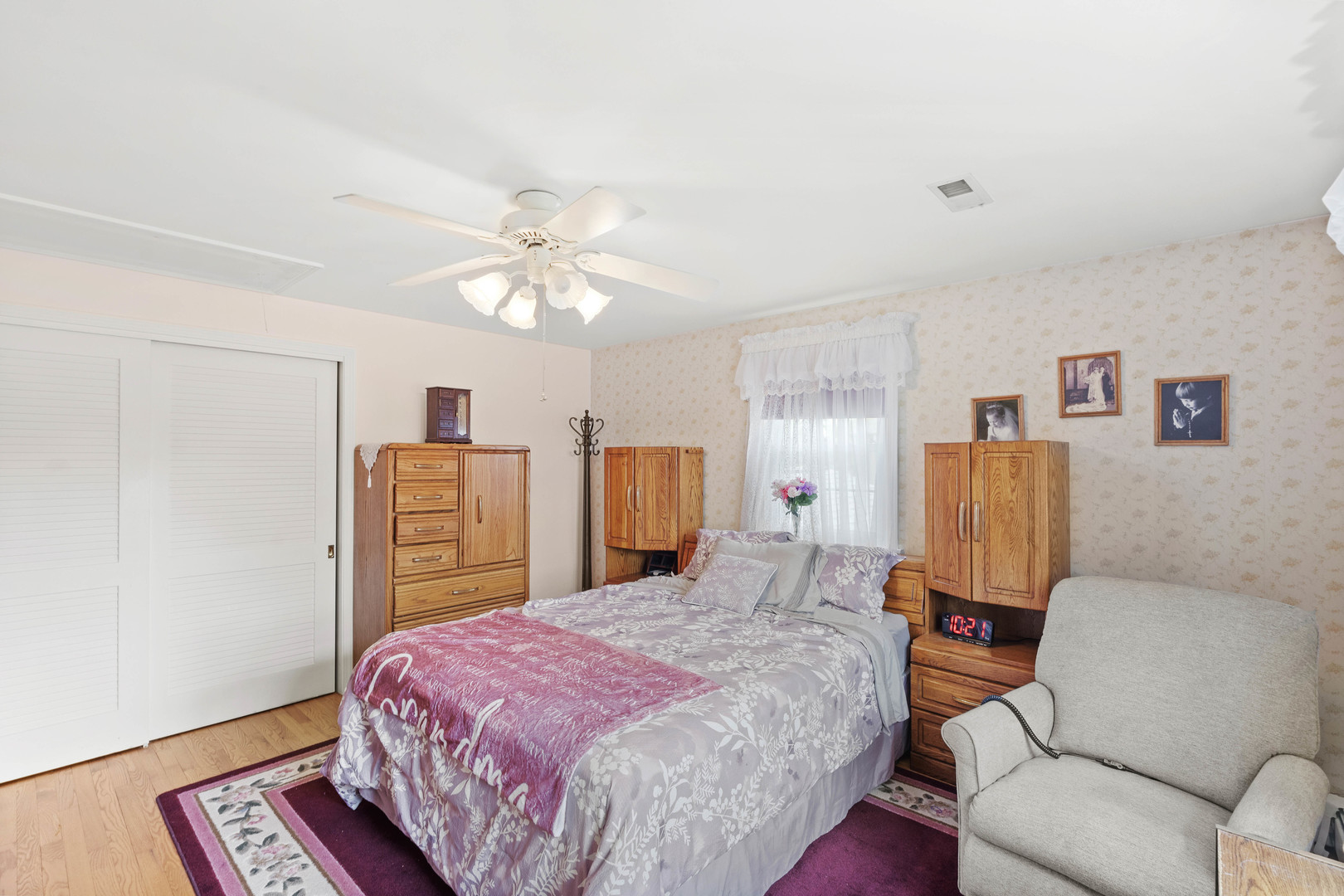 200 South Rathje Road Peotone, IL 60468 - Photo 21 of 39 a bedroom with a bed dresser and a window