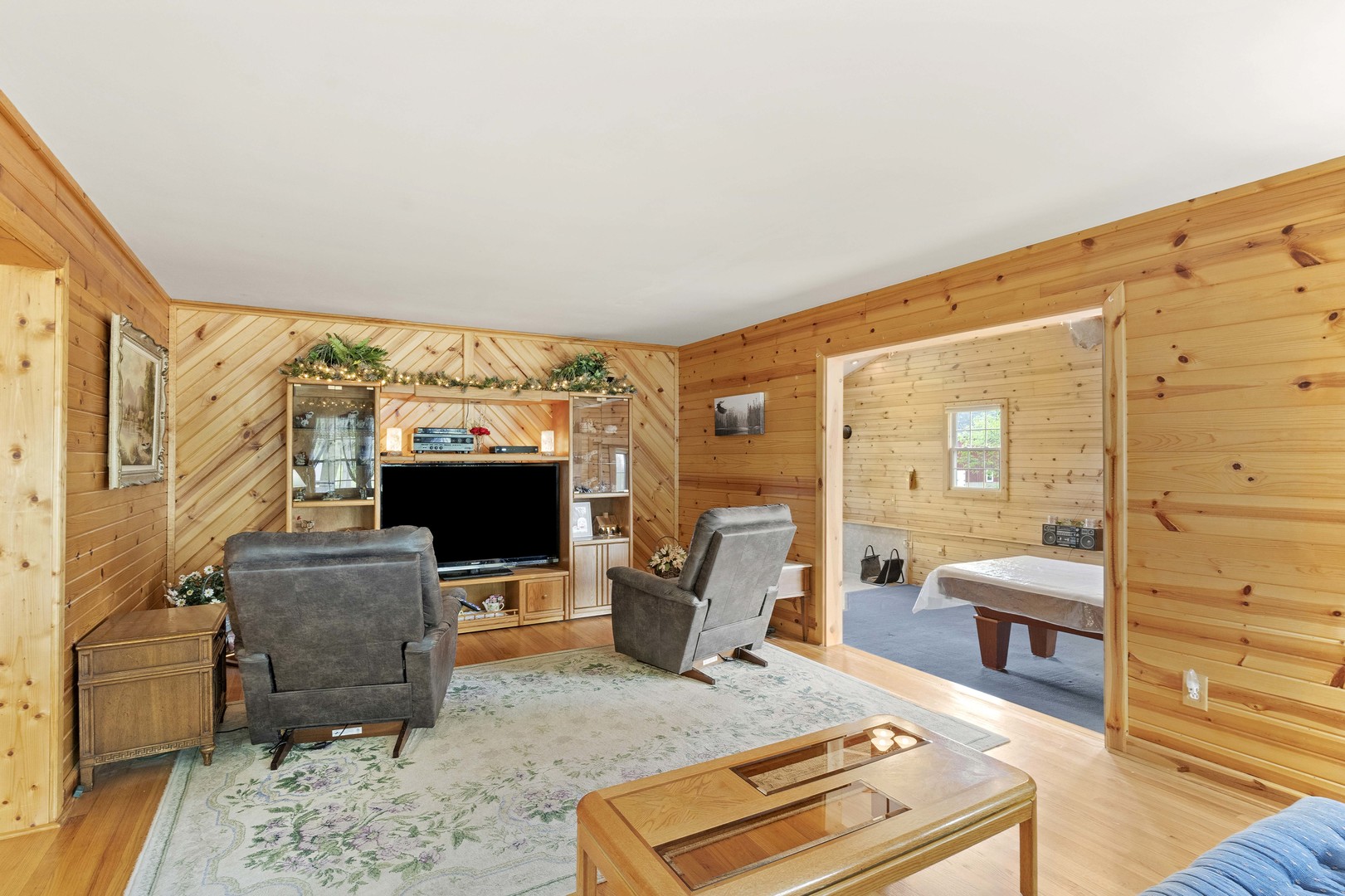200 South Rathje Road Peotone, IL 60468 - Photo 3 of 39 a living room with furniture and a flat screen tv