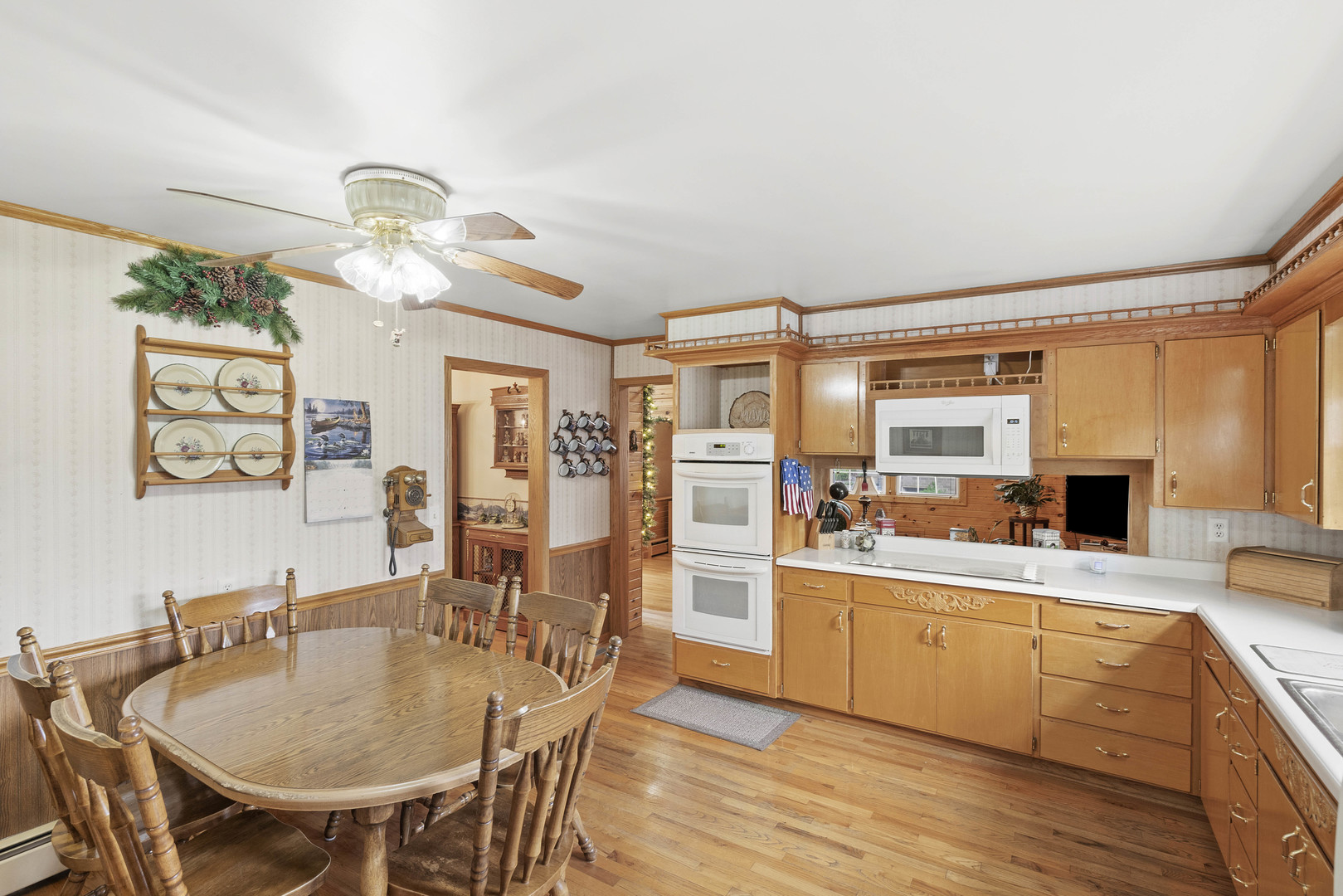 200 South Rathje Road Peotone, IL 60468 - Photo 8 of 39 a large kitchen with a table and chairs