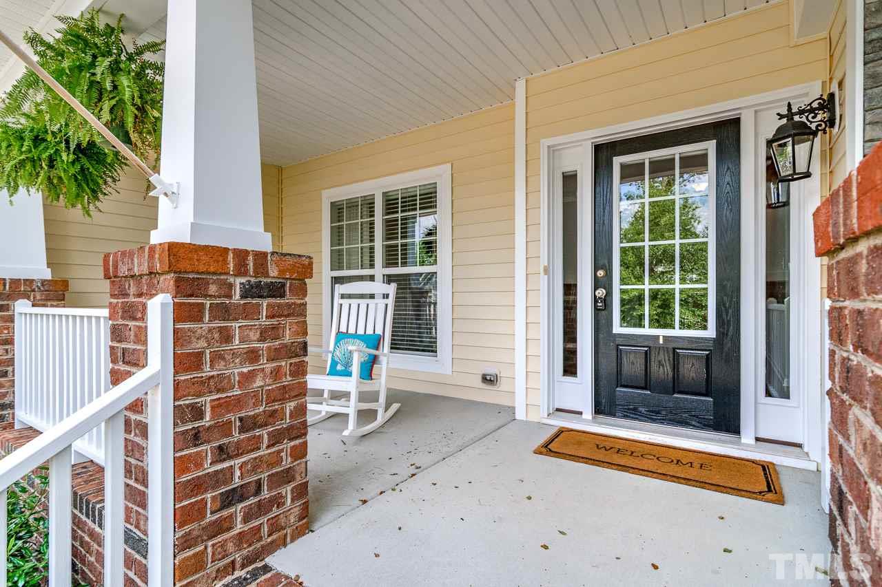 103 Key Biscayne Court Raleigh, NC 27603 - Photo 3 of 30 a backyard of a house with seating space