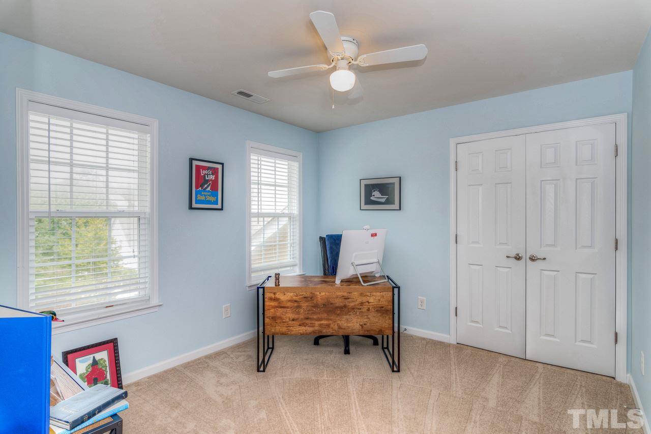 103 Key Biscayne Court Raleigh, NC 27603 - Photo 23 of 30 a living room with furniture and a window