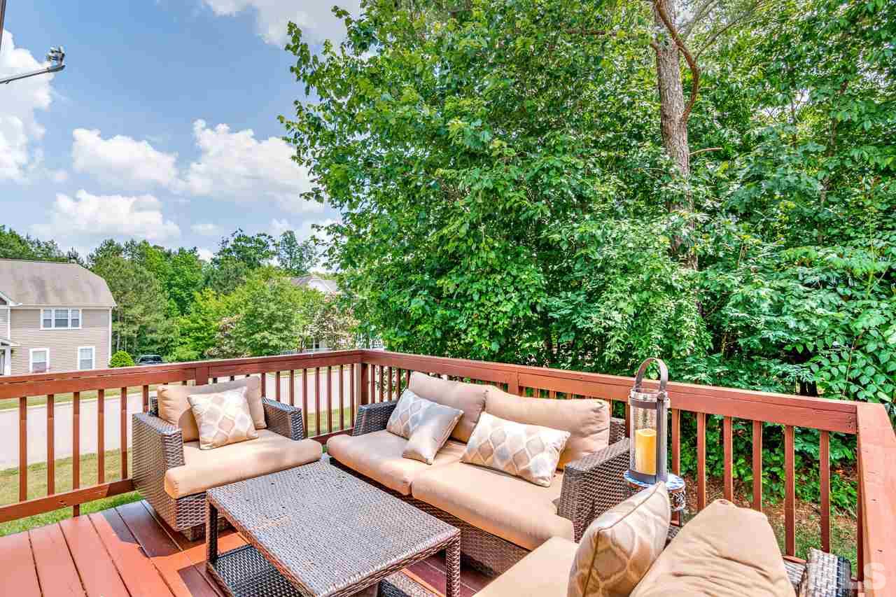 103 Key Biscayne Court Raleigh, NC 27603 - Photo 7 of 30 a view of a two chairs in the roof deck