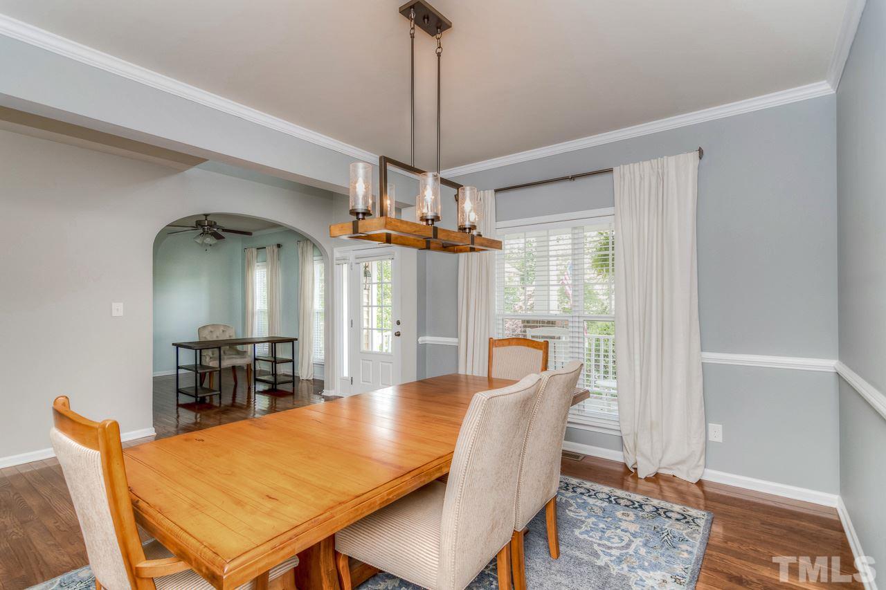 103 Key Biscayne Court Raleigh, NC 27603 - Photo 9 of 30 a dining room with furniture window and wooden floor