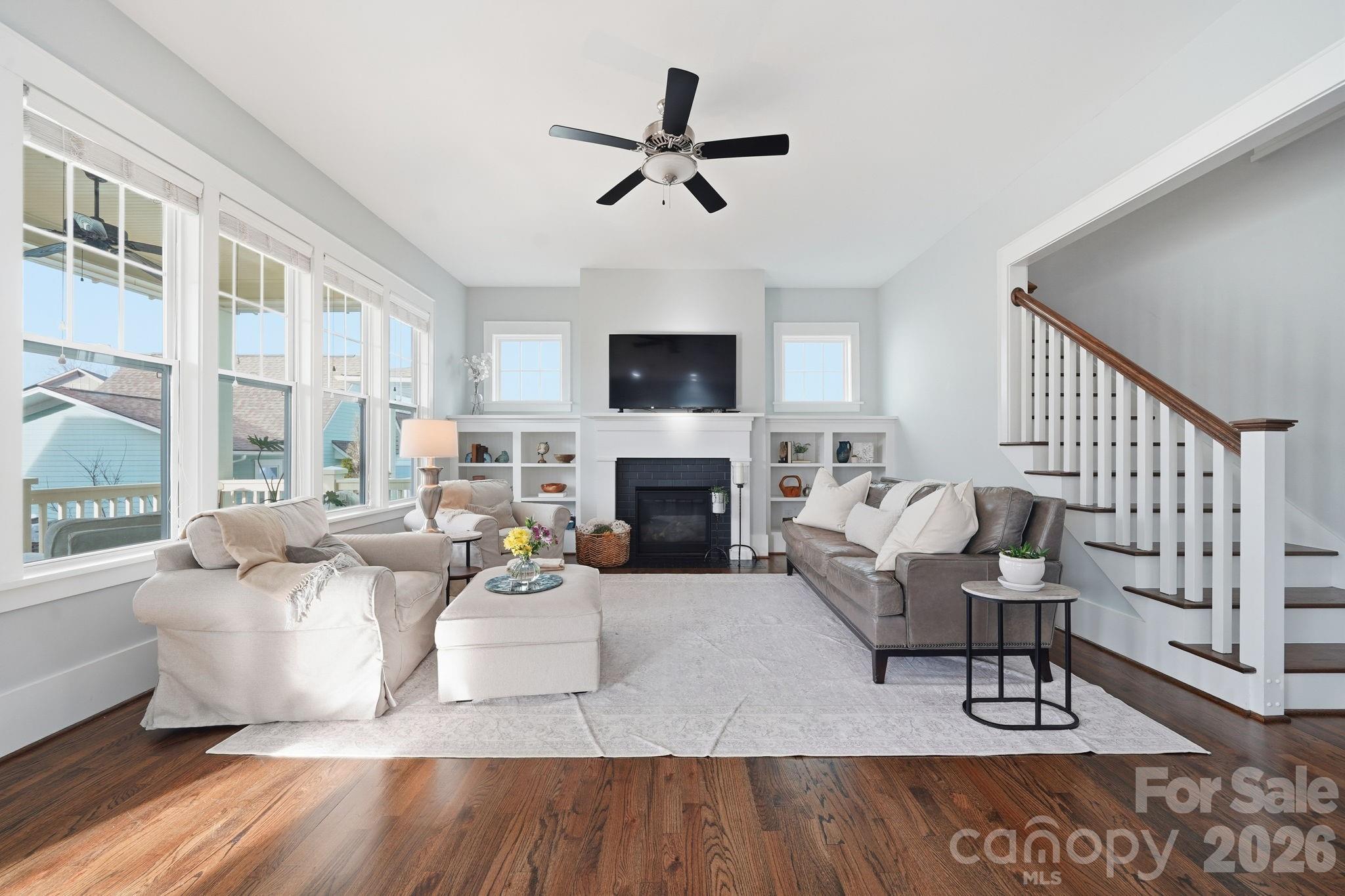 312 Mill Ridge Road Rock Hill, SC 29730 - Photo 14 of 42 a living room with furniture a fireplace and a flat screen tv
