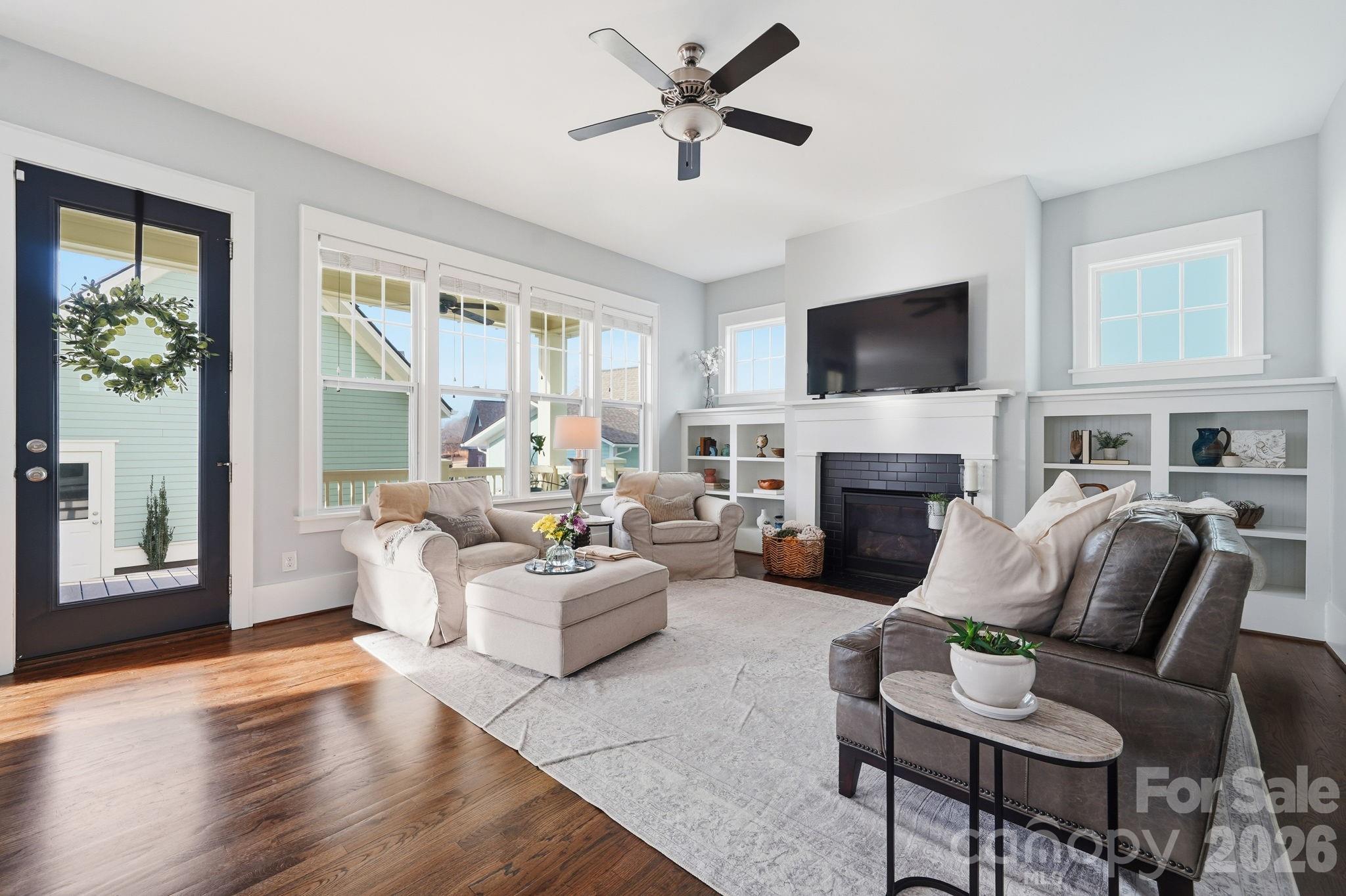 312 Mill Ridge Road Rock Hill, SC 29730 - Photo 15 of 42 a living room with furniture a flat screen tv and a fireplace
