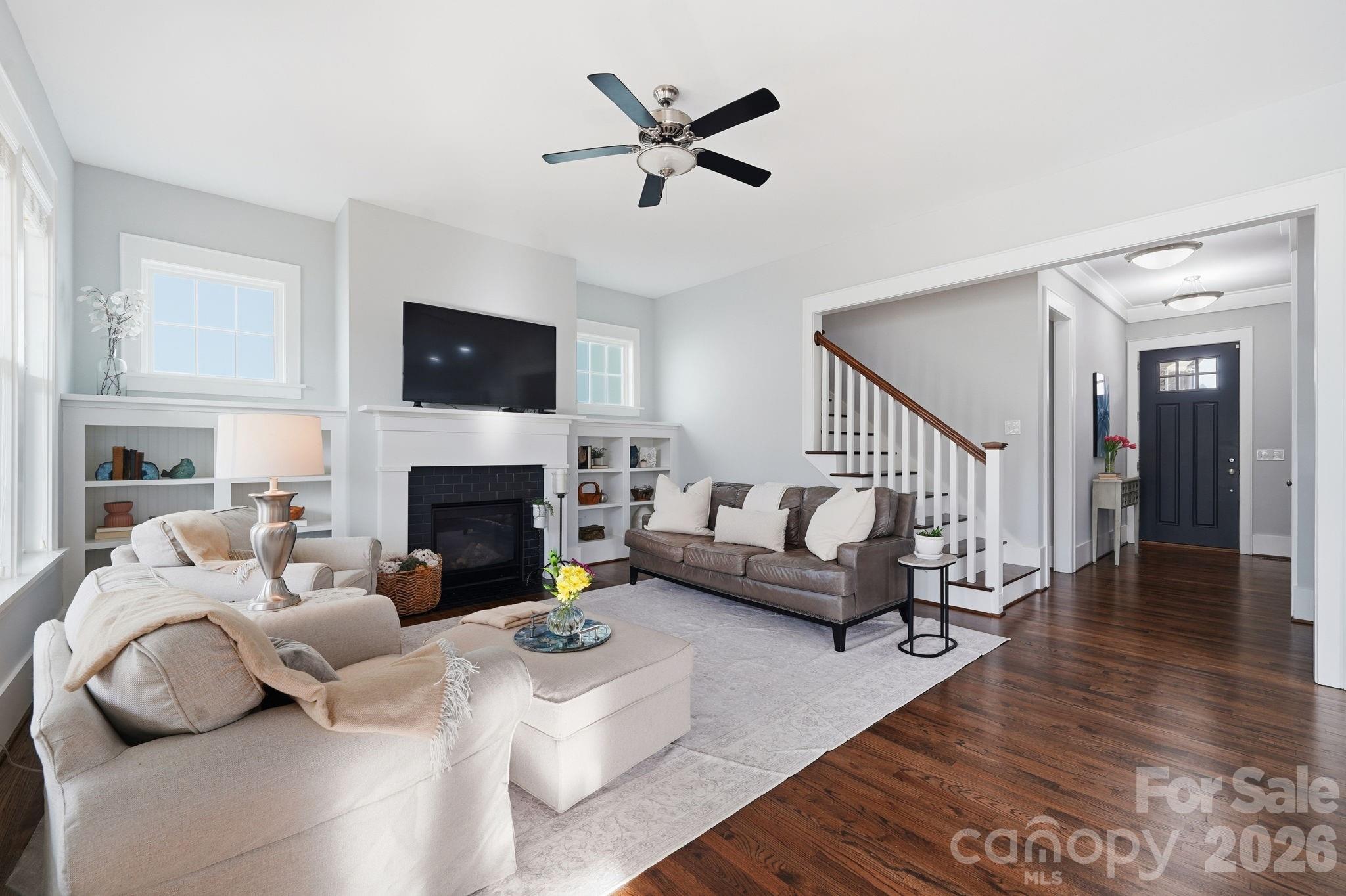 312 Mill Ridge Road Rock Hill, SC 29730 - Photo 16 of 42 a living room with furniture a fireplace and a flat screen tv