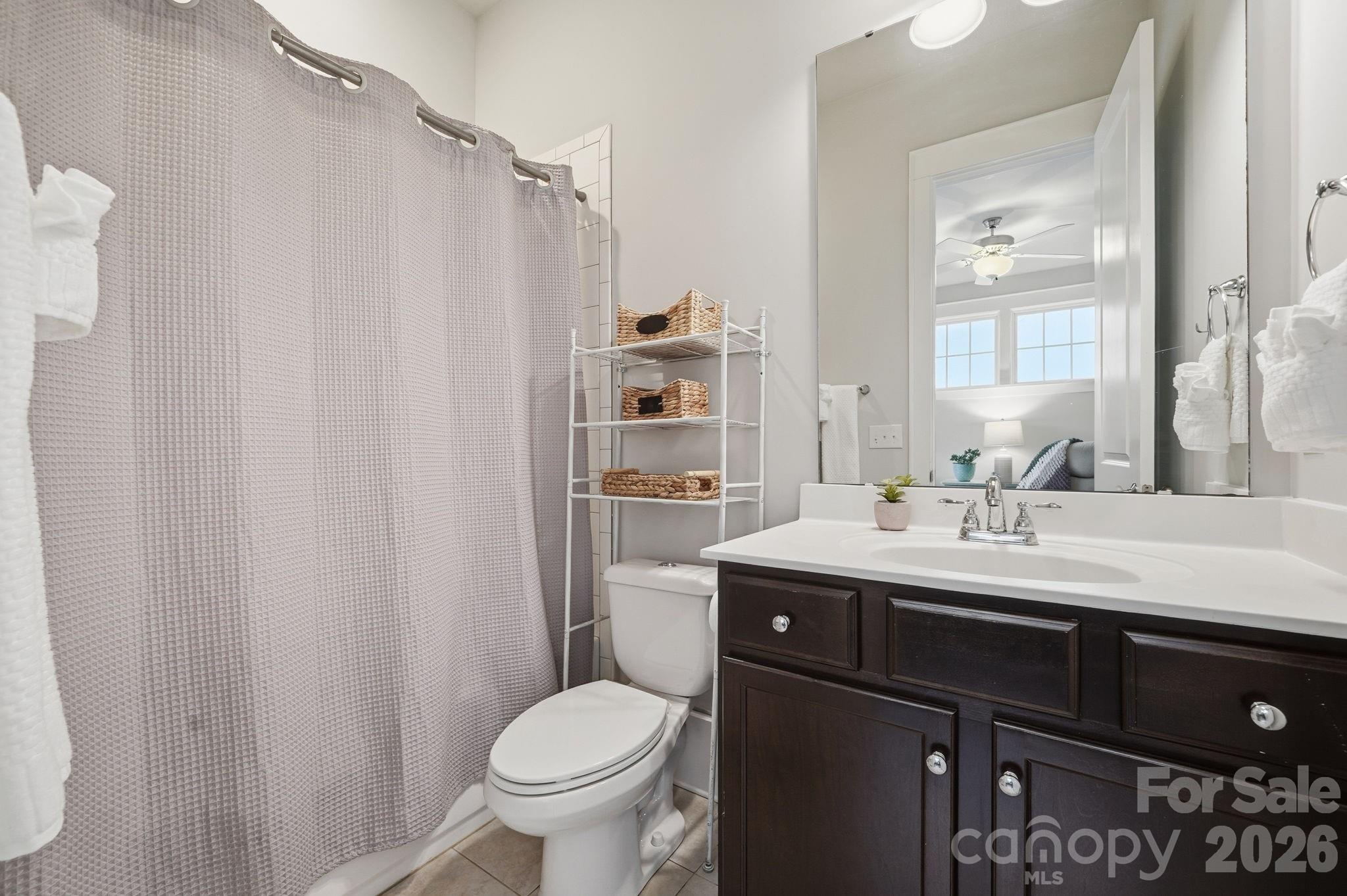 312 Mill Ridge Road Rock Hill, SC 29730 - Photo 35 of 42 a bathroom with a sink a toilet and shower