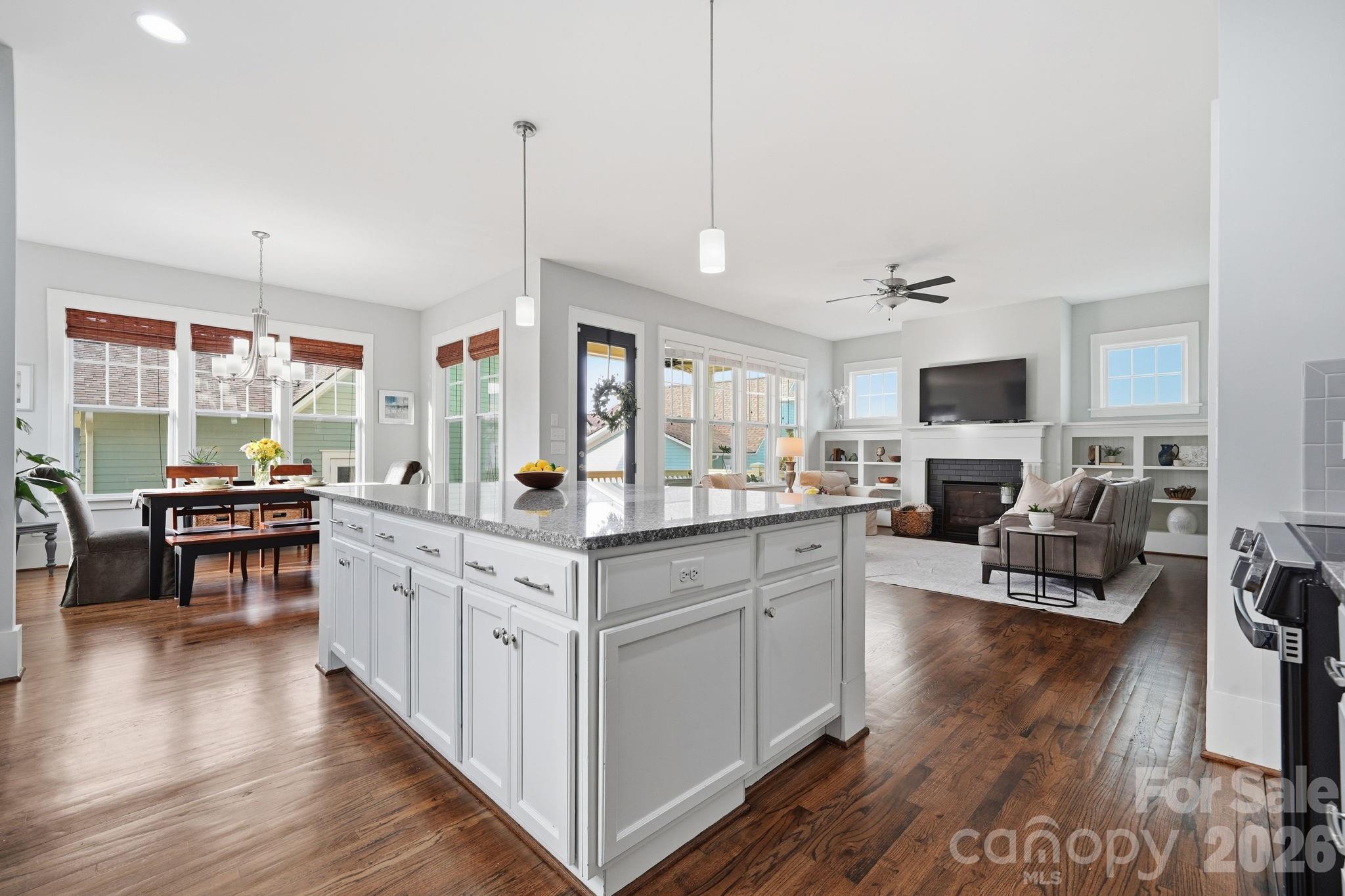 312 Mill Ridge Road Rock Hill, SC 29730 - Photo 10 of 42 a kitchen with stainless steel appliances granite countertop a lot of counter space and wooden floors
