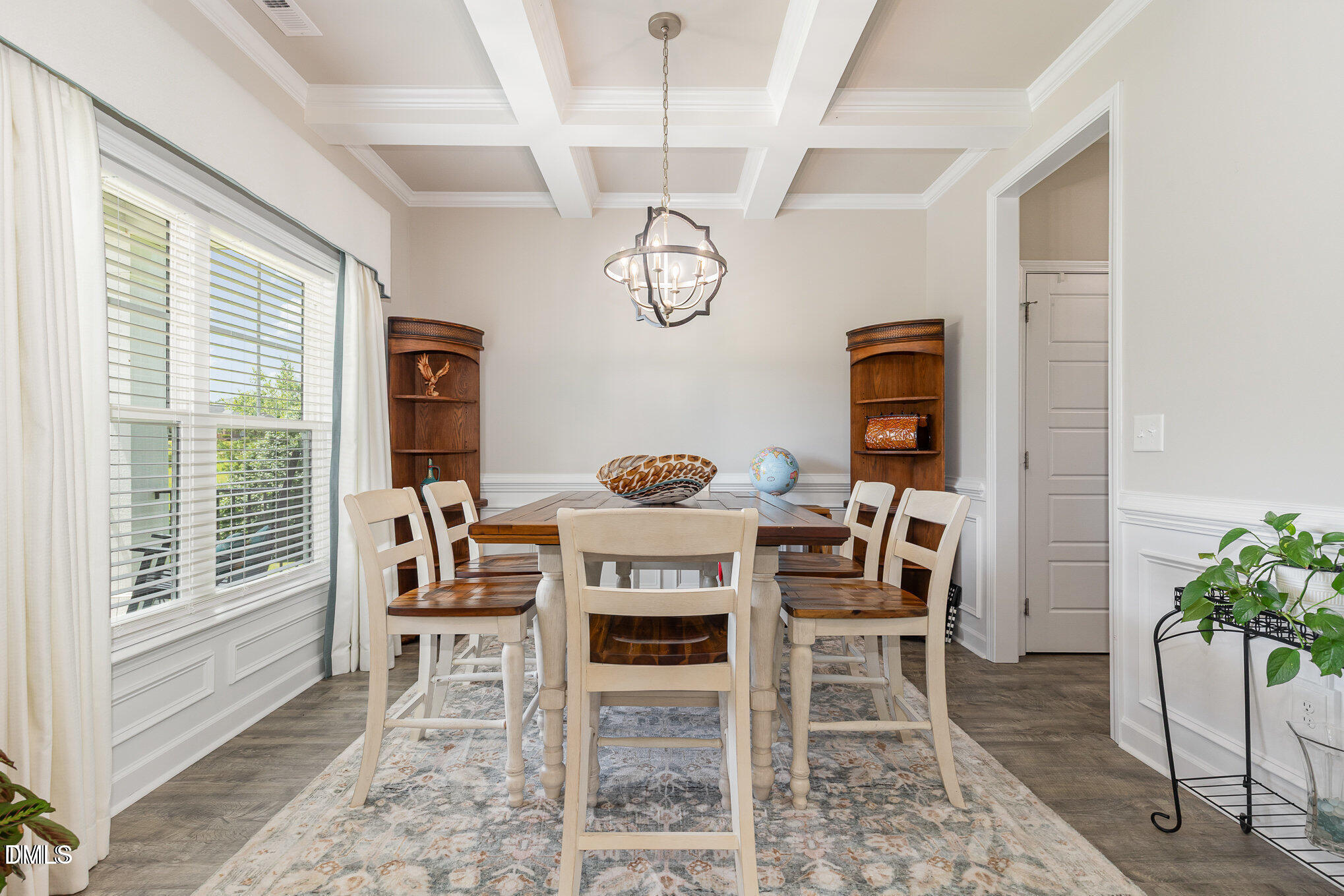 8662 Buckhorn Plantation Road Sims, NC 27880 - Photo 6 of 37 a dining room with furniture a potted plant and a rug