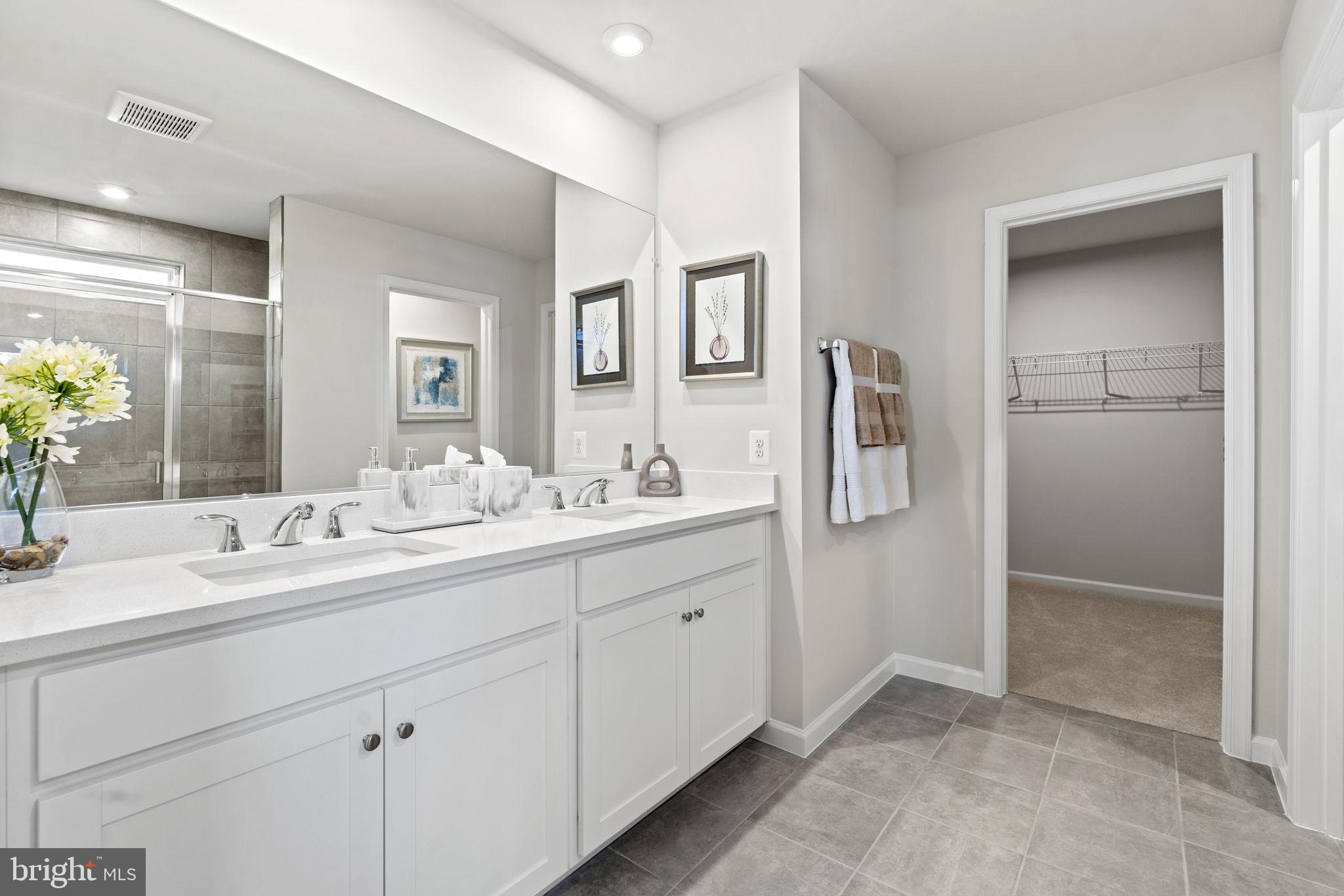 354 National Street Ranson, WV 25438 - Photo 11 of 39 a bathroom with a double vanity sink and mirror