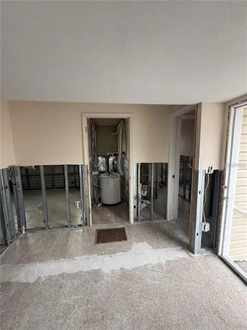 a view of a livingroom with furniture and a rug