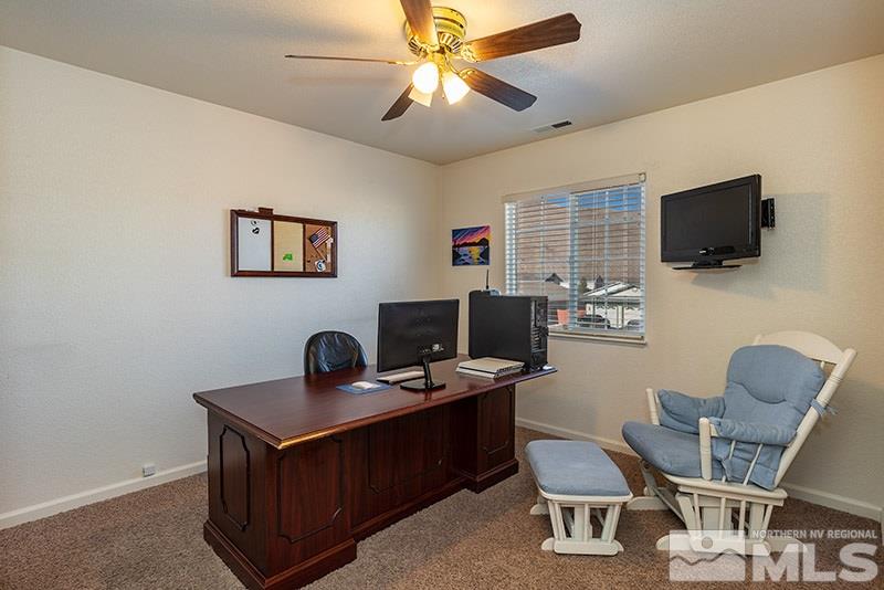 18366 Whitebark Court Reno, NV 89508 - Photo 11 of 36 a view of a workspace with furniture