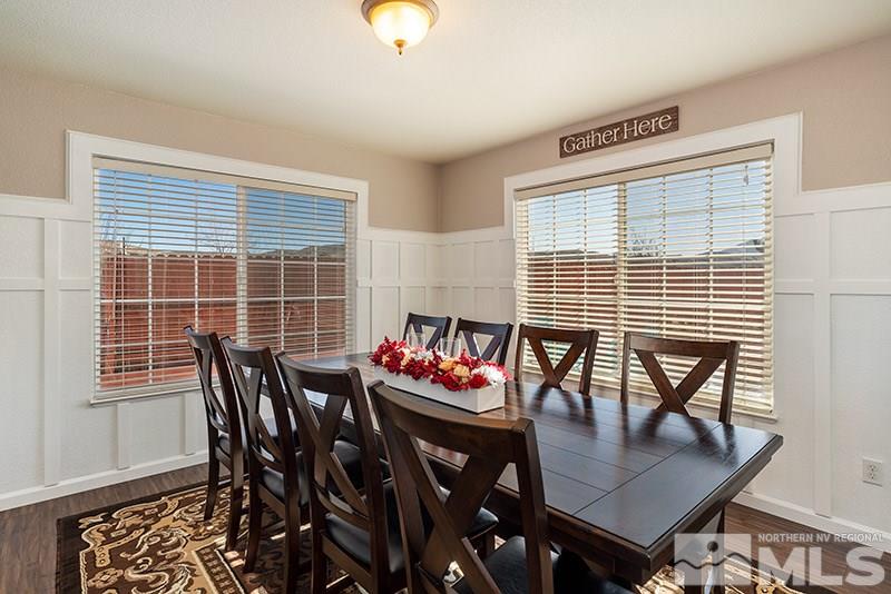 18366 Whitebark Court Reno, NV 89508 - Photo 2 of 36 a view of a dining room with furniture and wooden floor