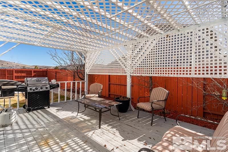 18366 Whitebark Court Reno, NV 89508 - Photo 23 of 36 a outdoor view with a sitting space