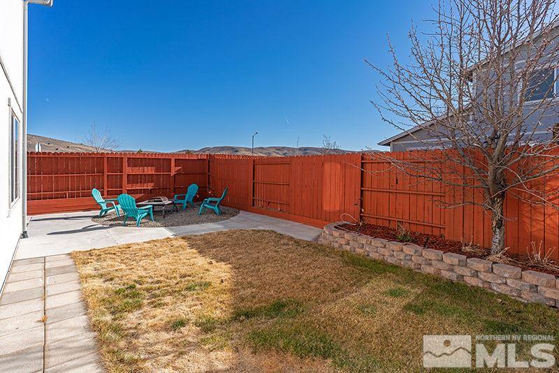 18366 Whitebark Court Reno, NV 89508 - Photo 25 of 36 a view of a backyard of the house